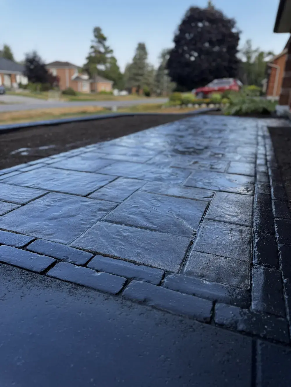 Freshly laid Golden Maple stone walkway — real work ready to become marketing proof