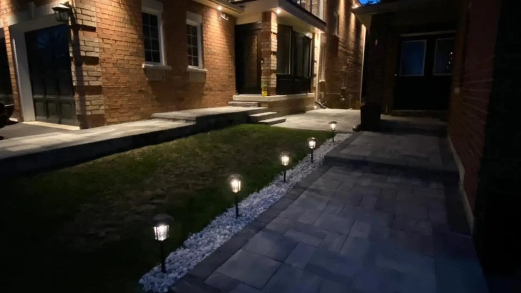 Interlock walkway with landscape lighting — a completed Golden Maple Landscaping job in Barrie, Ontario